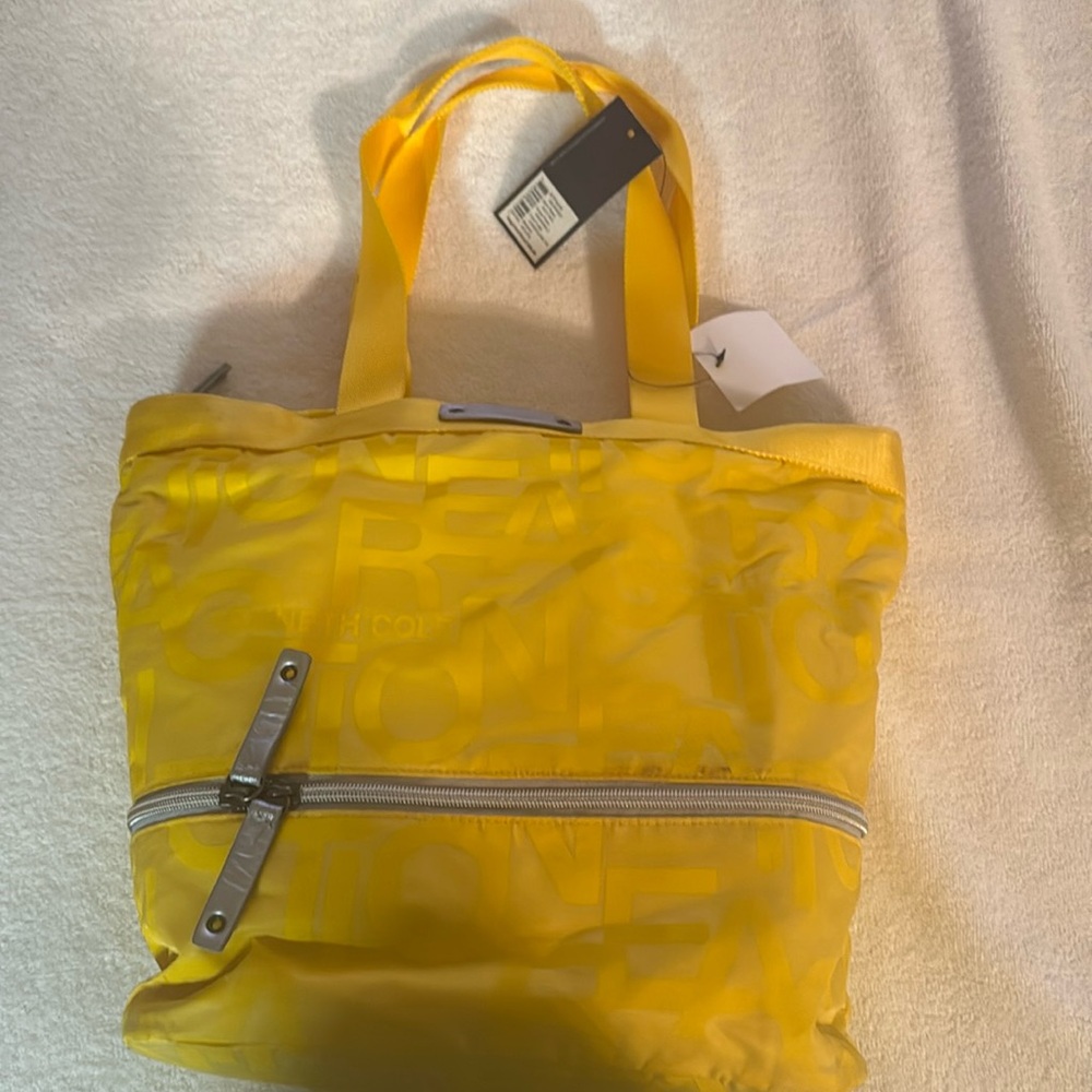 A Kenneth Cole SATCHEL bag with matching umbrella and pouch